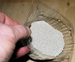 Desiccant from misted sealed double glazing